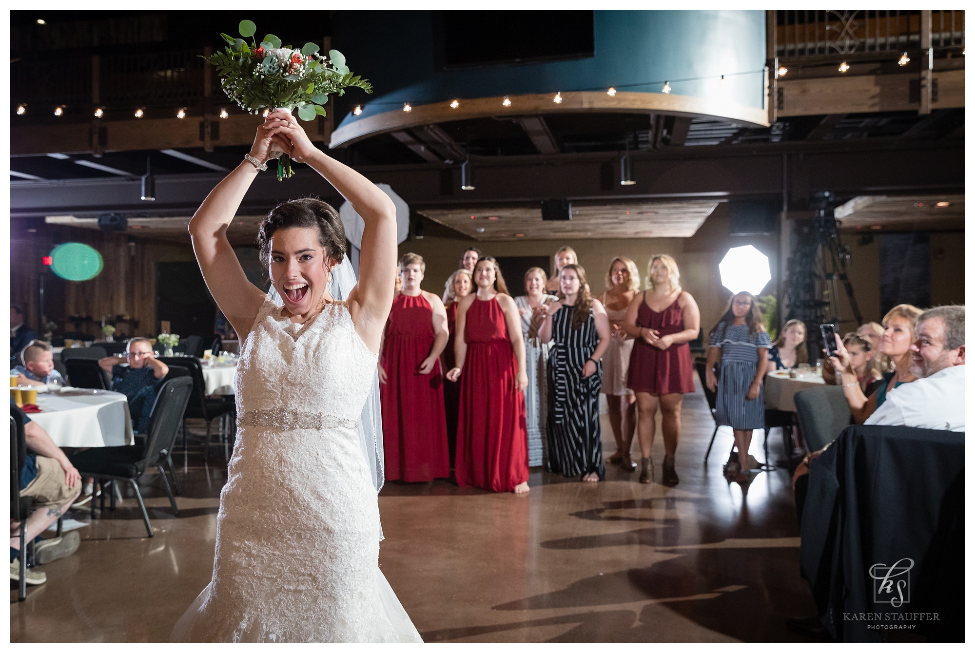 Bouquet toss - Bloomington Illinois wedding photographer