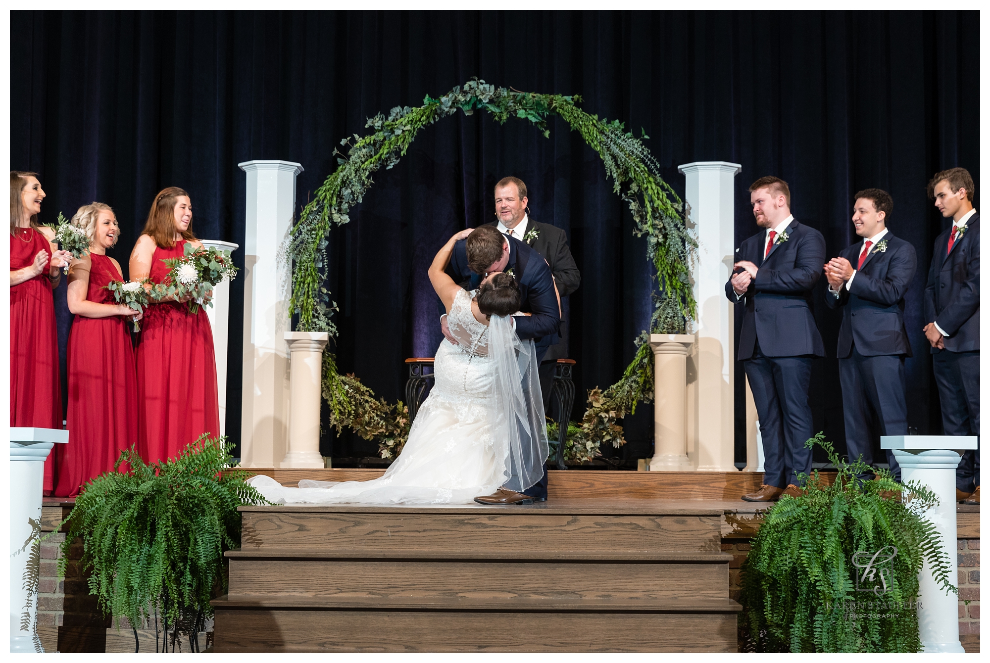 The kiss.  Photo taken by Central Illinois wedding photographer